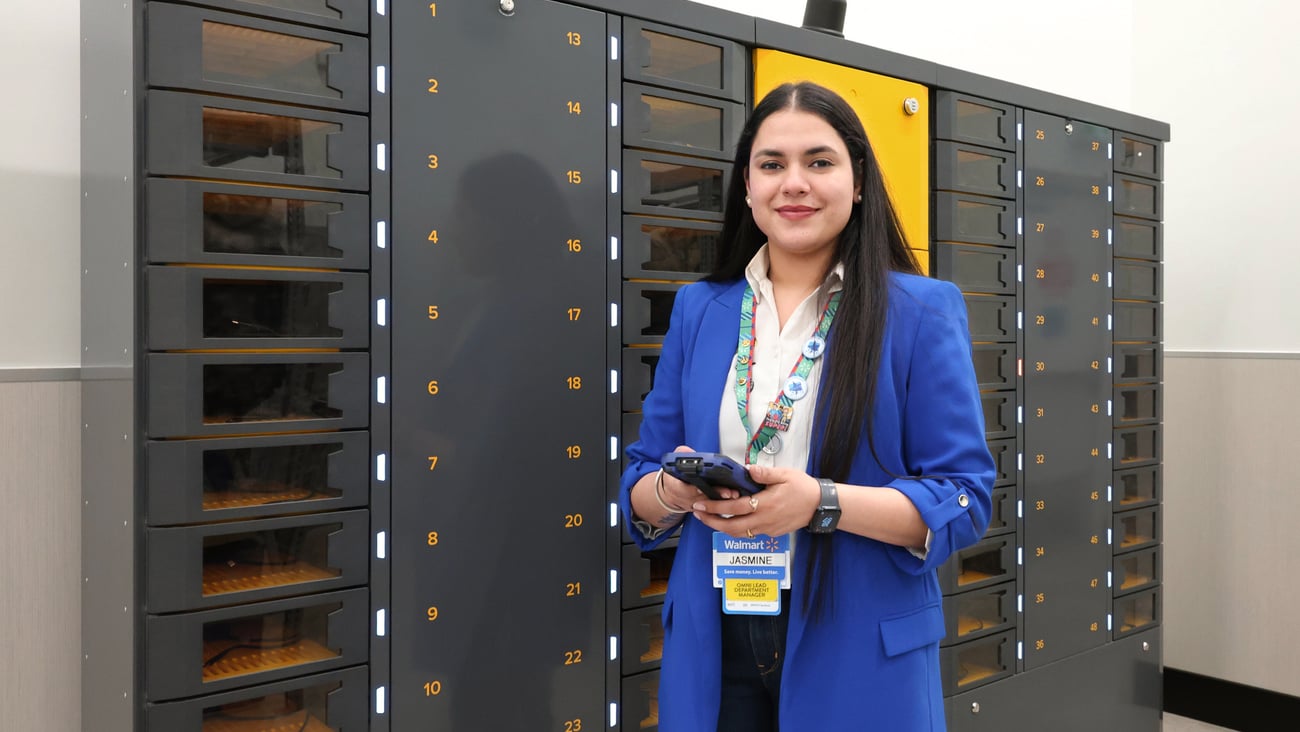 A Walmart Canada associate using an ARC smart locker (Photo: Walmart).